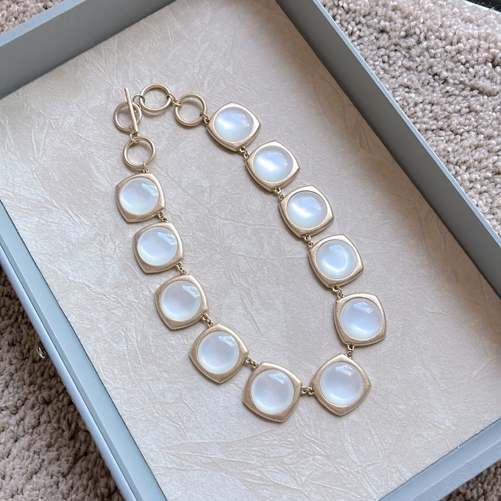 Elegant Gold and White Necklace